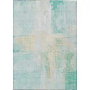 Photo of Teal Blue And Wheat Abstract Washable Indoor Outdoor Area Rug