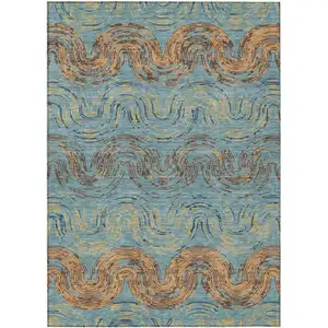 Photo of Teal Blue And Wheat Abstract Washable Indoor Outdoor Area Rug