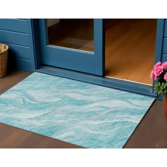Teal Blue Aqua And Ivory Abstract Washable Indoor Outdoor Area Rug Photo 1