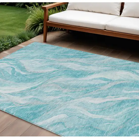 Teal Blue Aqua And Ivory Abstract Washable Indoor Outdoor Area Rug Photo 1