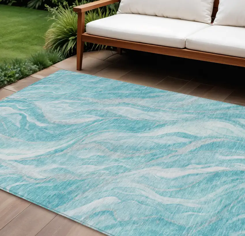 Teal Blue Aqua And Ivory Abstract Washable Indoor Outdoor Area Rug Photo 1