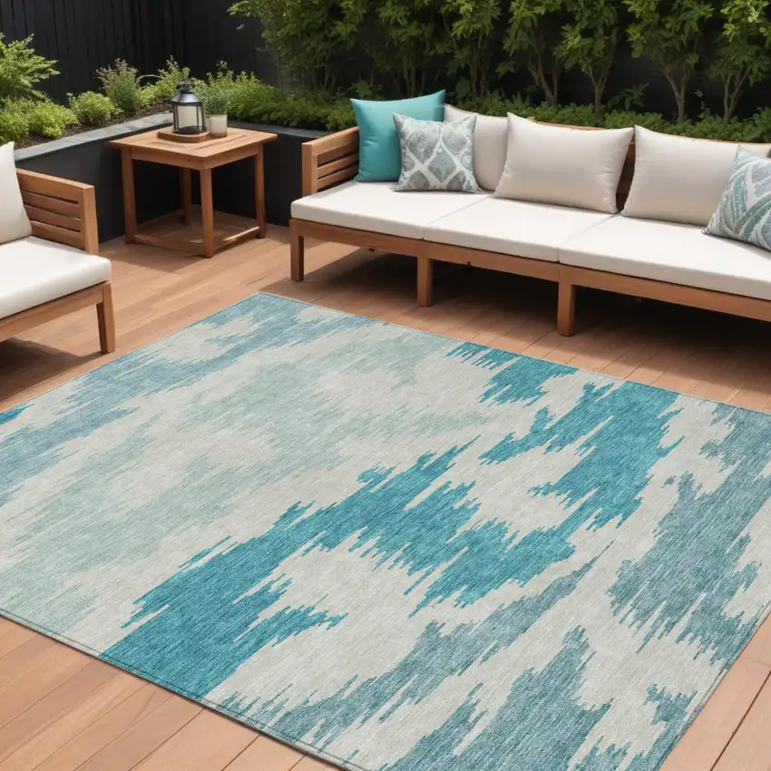 Teal Blue Aqua And Ivory Abstract Washable Indoor Outdoor Area Rug Photo 1