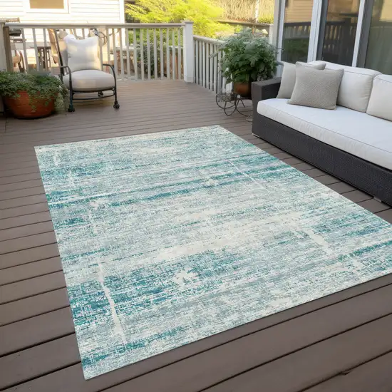 Teal Blue Aqua And Ivory Abstract Washable Indoor Outdoor Area Rug Photo 9