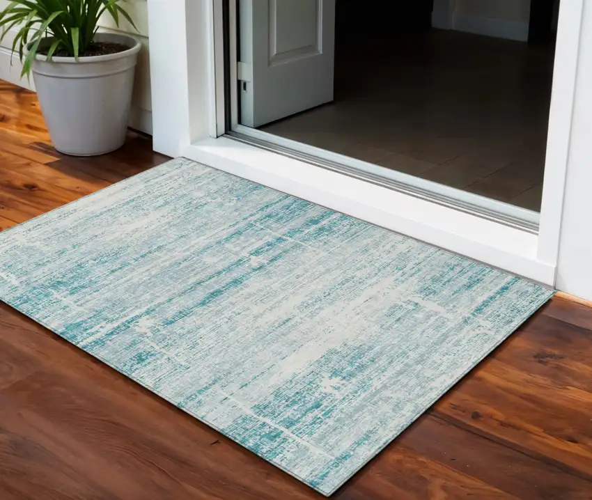 Teal Blue Aqua And Ivory Abstract Washable Indoor Outdoor Area Rug Photo 1