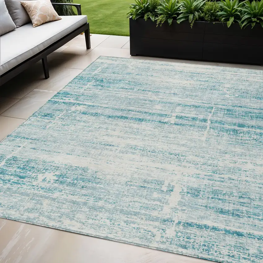 Teal Blue Aqua And Ivory Abstract Washable Indoor Outdoor Area Rug Photo 1