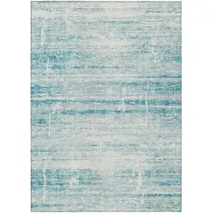 Photo of Teal Blue Aqua And Ivory Abstract Washable Indoor Outdoor Area Rug