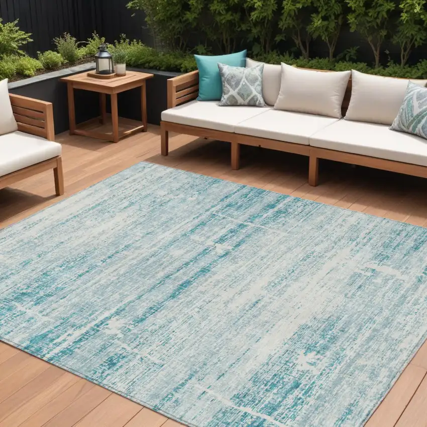 Teal Blue Aqua And Ivory Abstract Washable Indoor Outdoor Area Rug Photo 1