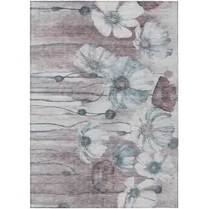 Photo of Teal Blue Aqua And Ivory Floral Washable Indoor Outdoor Area Rug