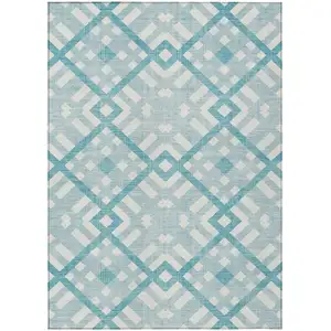 Photo of Teal Blue Aqua And Ivory Geometric Washable Indoor Outdoor Area Rug