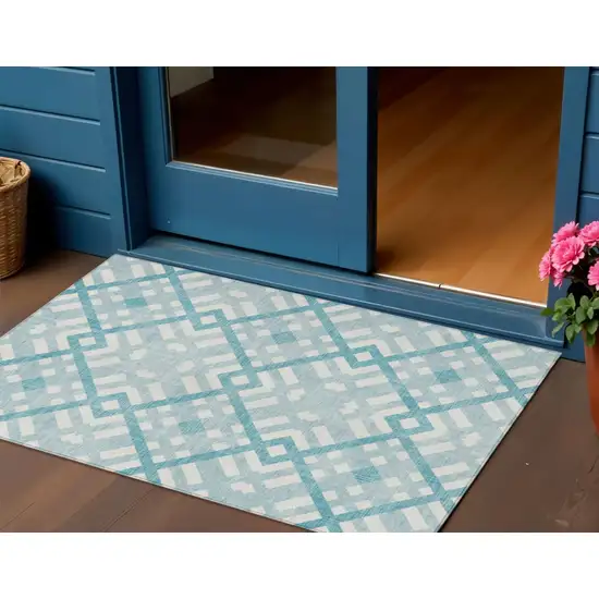 Teal Blue Aqua And Ivory Geometric Washable Indoor Outdoor Area Rug Photo 1