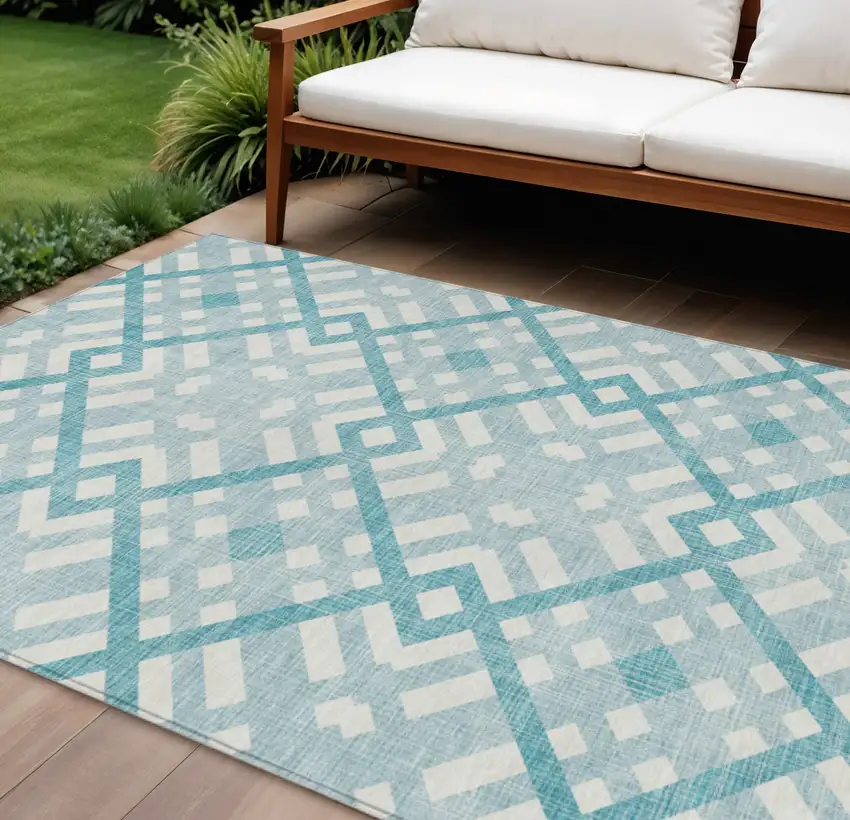 Teal Blue Aqua And Ivory Geometric Washable Indoor Outdoor Area Rug Photo 1