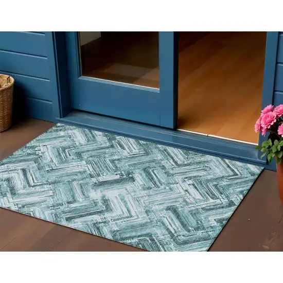 Teal Blue Aqua And Ivory Geometric Washable Indoor Outdoor Area Rug Photo 1