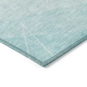 Photo of Teal Blue Aqua And Ivory Geometric Washable Indoor Outdoor Area Rug