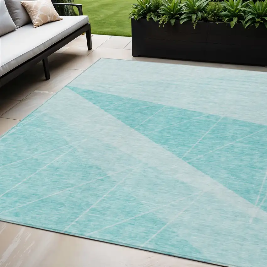 Teal Blue Aqua And Ivory Geometric Washable Indoor Outdoor Area Rug Photo 1