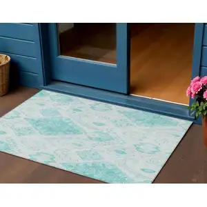Photo of Teal Blue Aqua And Ivory Moroccan Washable Indoor Outdoor Area Rug