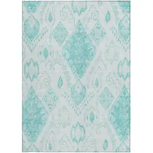 Photo of Teal Blue Aqua And Ivory Moroccan Washable Indoor Outdoor Area Rug