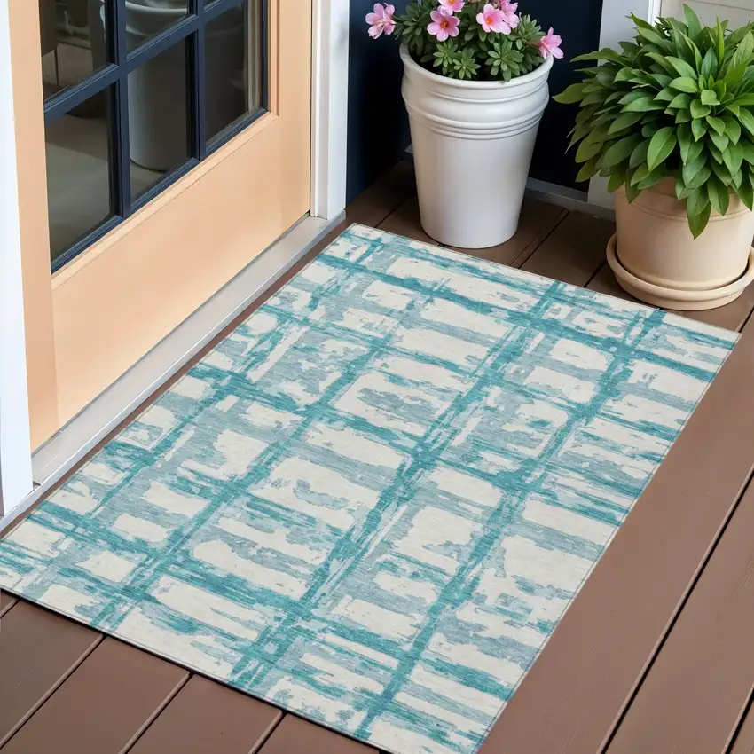 Teal Blue Aqua And Ivory Striped Washable Indoor Outdoor Area Rug Photo 1