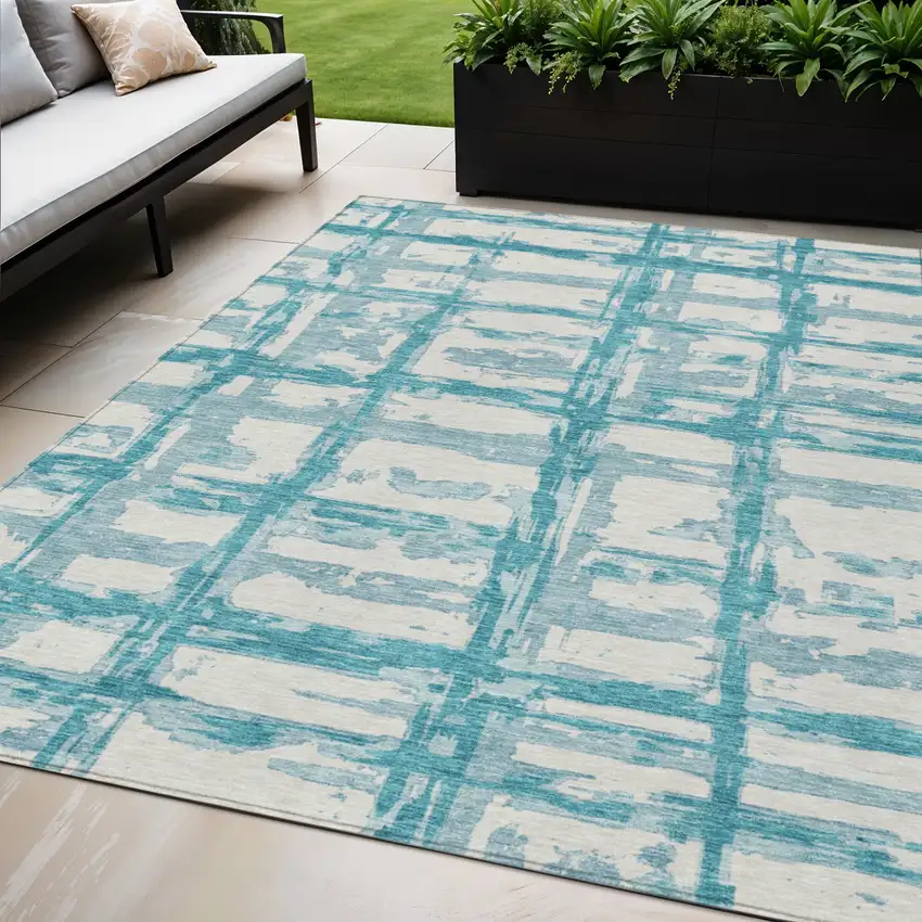 Teal Blue Aqua And Ivory Striped Washable Indoor Outdoor Area Rug Photo 1