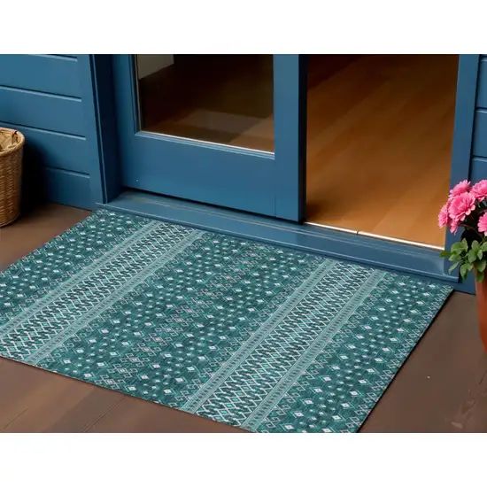 Teal Blue Aqua And Ivory Tribal Washable Indoor Outdoor Area Rug Photo 1