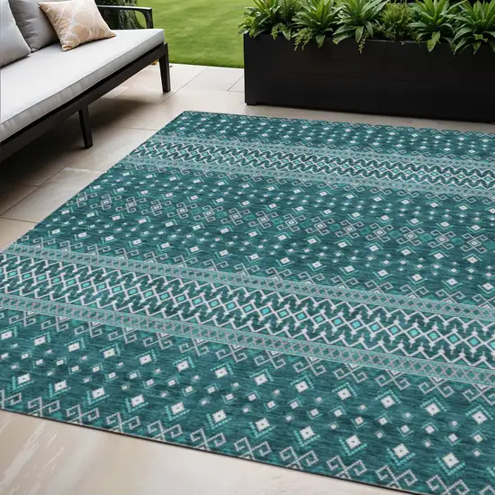 Teal Blue Aqua And Ivory Tribal Washable Indoor Outdoor Area Rug Photo 1