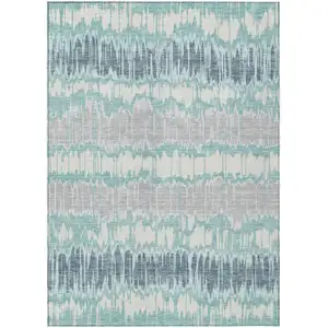 Photo of Teal Blue Aqua And Silver Striped Washable Indoor Outdoor Area Rug