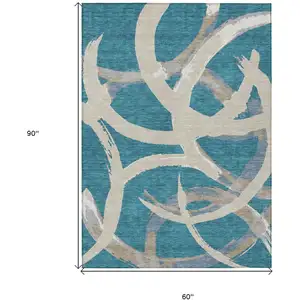 Photo of Teal Blue Beige And Gray Abstract Washable Indoor Outdoor Area Rug