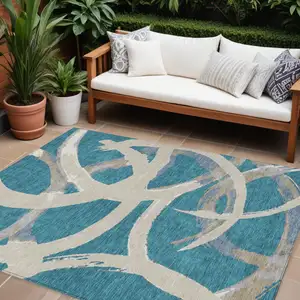 Photo of Teal Blue Beige And Gray Abstract Washable Indoor Outdoor Area Rug