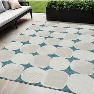 Photo of Teal Blue Beige And Ivory Abstract Washable Indoor Outdoor Area Rug