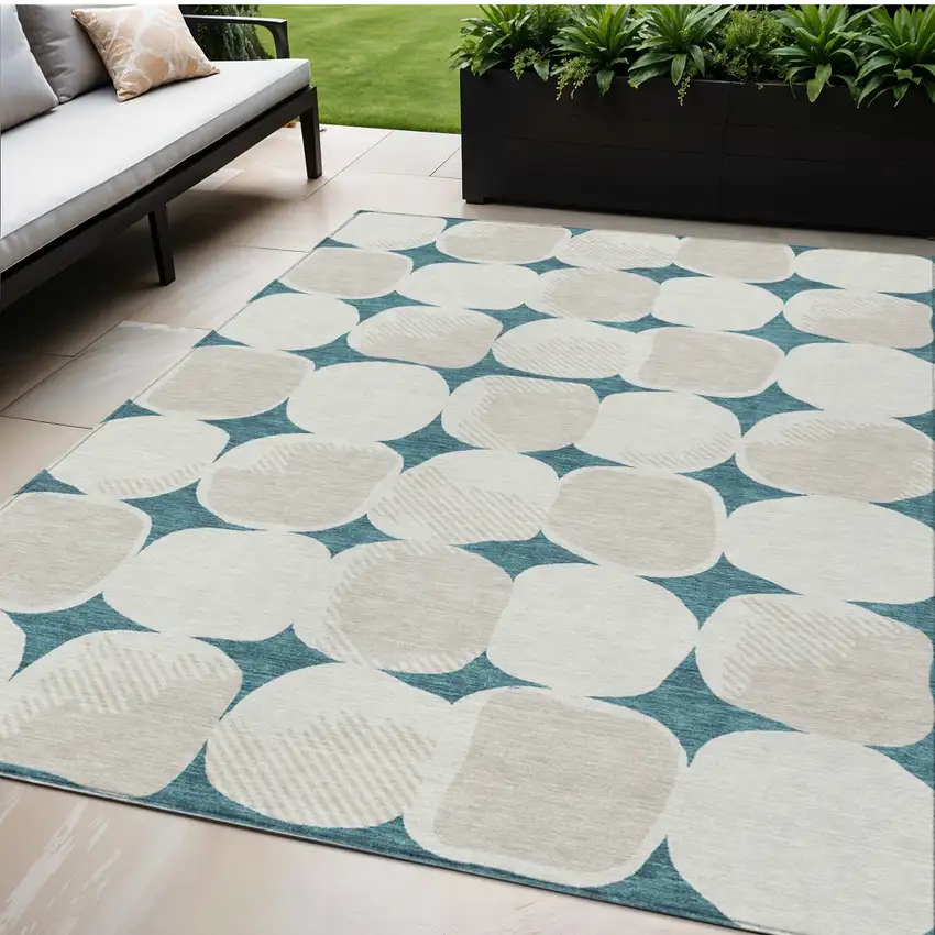 Teal Blue Beige And Ivory Abstract Washable Indoor Outdoor Area Rug Photo 1