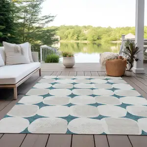 Photo of Teal Blue Beige And Ivory Abstract Washable Indoor Outdoor Area Rug