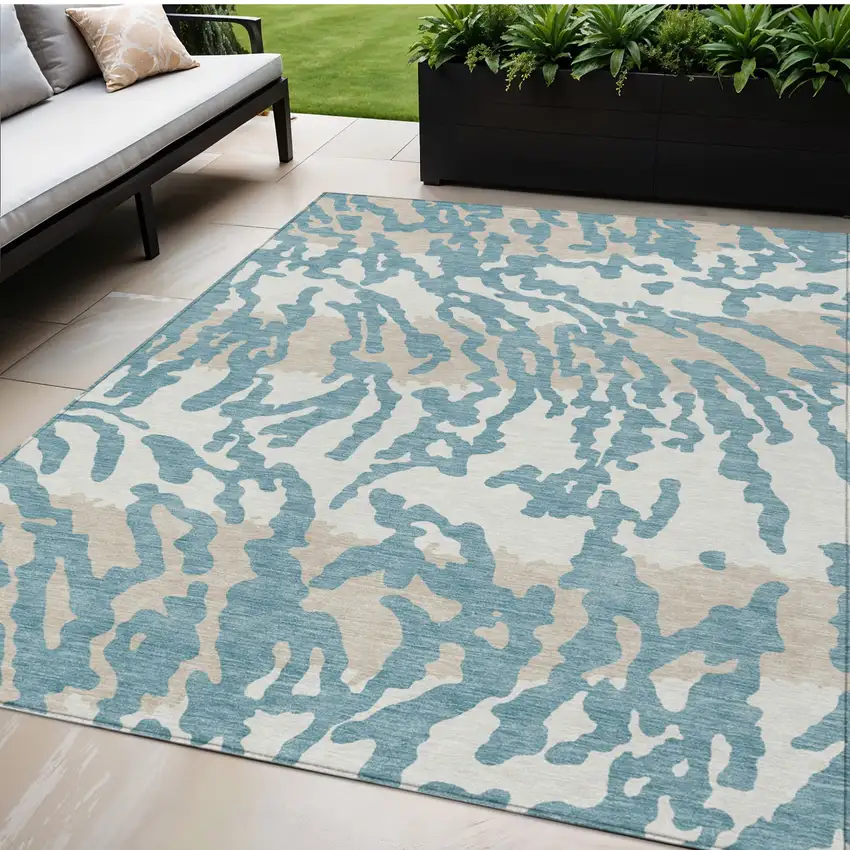 Teal Blue Beige And Ivory Animal Print Washable Indoor Outdoor Area Rug Photo 1