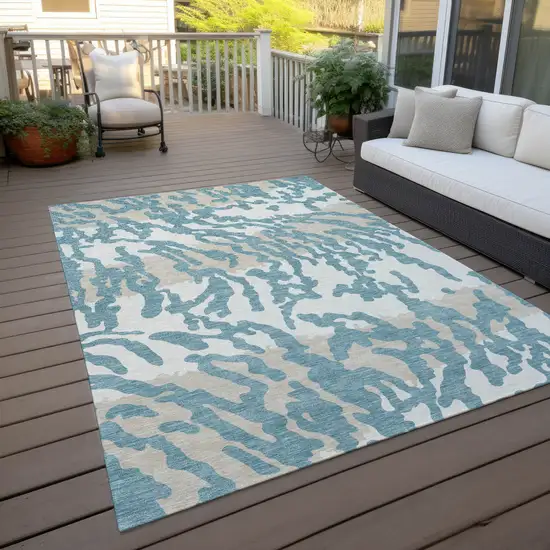 Teal Blue Beige And Ivory Animal Print Washable Indoor Outdoor Area Rug Photo 9