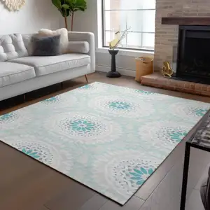 Photo of Teal Blue Beige And Ivory Floral Medallion Washable Indoor Outdoor Area Rug