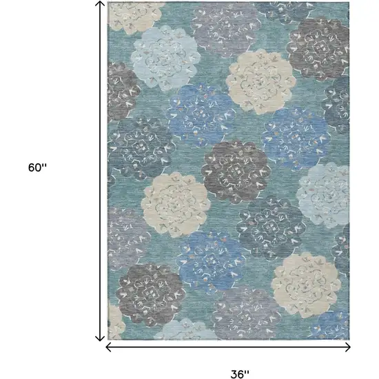 Teal Blue Beige And Ivory Quatrefoil Washable Indoor Outdoor Area Rug Photo 3