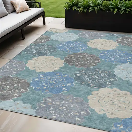 Teal Blue Beige And Ivory Quatrefoil Washable Indoor Outdoor Area Rug Photo 1
