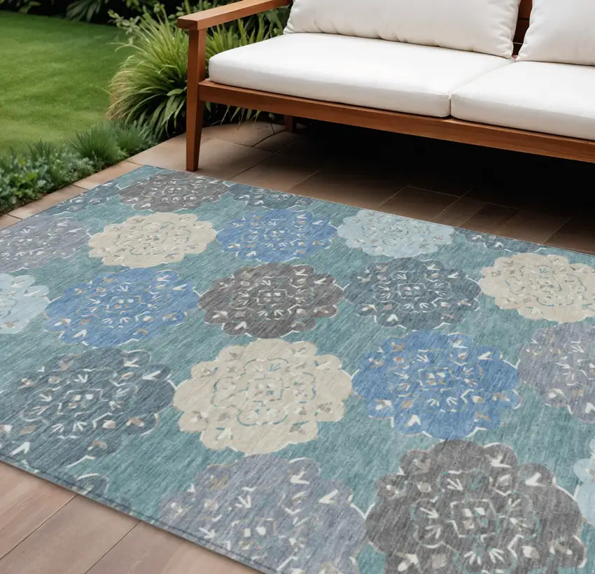 Teal Blue Beige And Ivory Quatrefoil Washable Indoor Outdoor Area Rug Photo 1