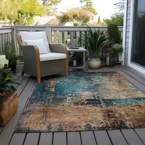Photo of Teal Blue Black And Copper Abstract Washable Indoor Outdoor Area Rug