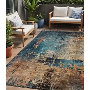 Photo of Teal Blue Black And Copper Abstract Washable Indoor Outdoor Area Rug