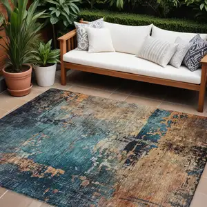Photo of Teal Blue Black And Copper Abstract Washable Indoor Outdoor Area Rug