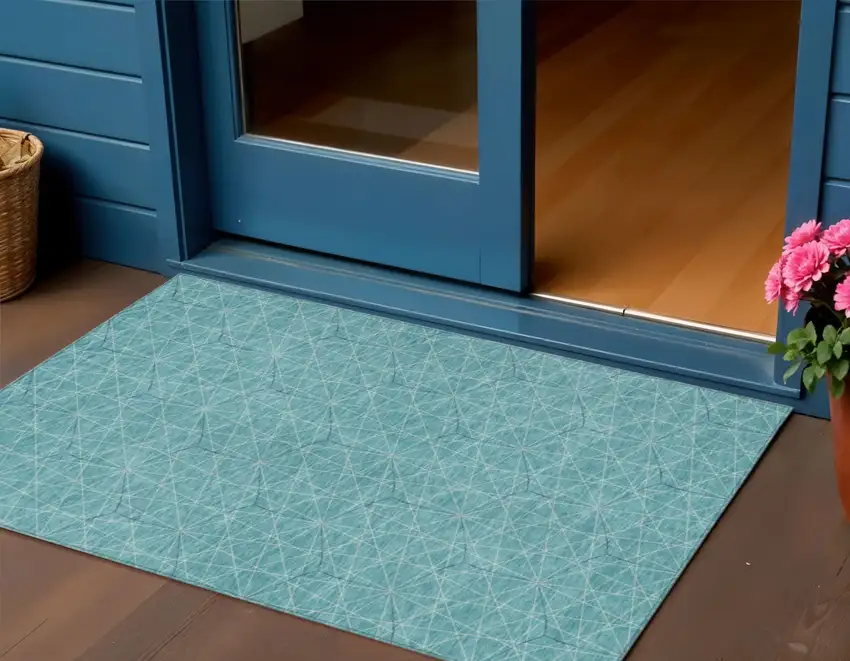 Teal Blue Black And Ivory Geometric Washable Indoor Outdoor Area Rug Photo 1