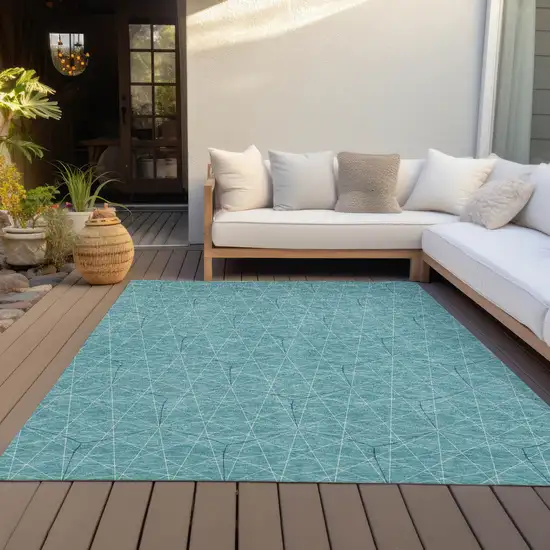 Teal Blue Black And Ivory Geometric Washable Indoor Outdoor Area Rug Photo 7
