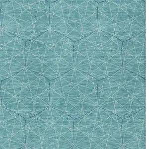 Photo of Teal Blue Black And Ivory Geometric Washable Indoor Outdoor Area Rug