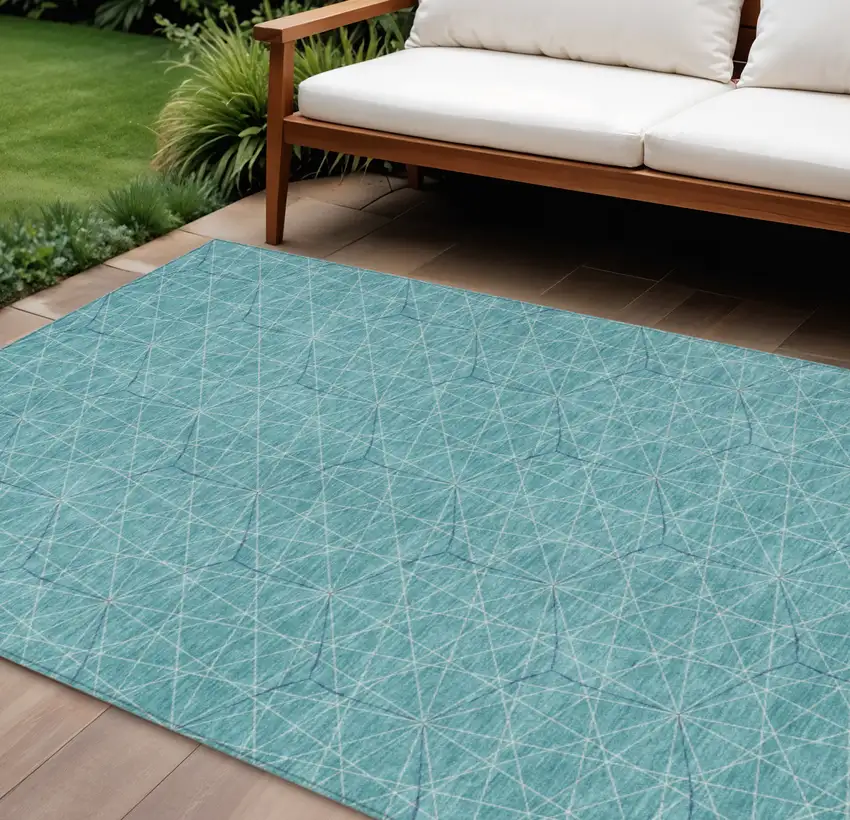 Teal Blue Black And Ivory Geometric Washable Indoor Outdoor Area Rug Photo 1