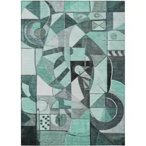 Photo of Teal Blue Black Ivory And Gray Abstract Washable Indoor Outdoor Area Rug