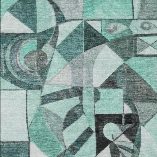 Teal Blue Black Ivory And Gray Abstract Washable Indoor Outdoor Area Rug Photo 4