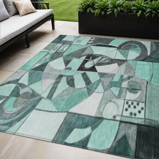 Teal Blue Black Ivory And Gray Abstract Washable Indoor Outdoor Area Rug Photo 2