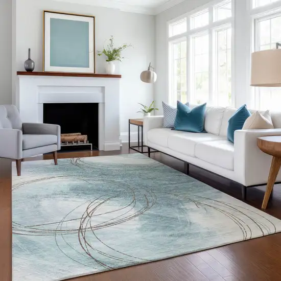 Teal Blue Brown And Ivory Abstract Washable Indoor Outdoor Area Rug Photo 4