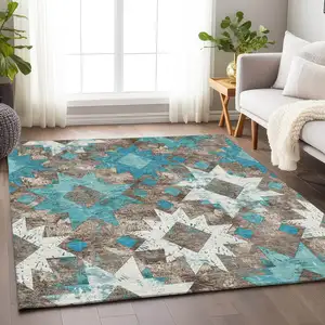 Photo of Teal Blue Brown And Ivory Aztec Washable Indoor Outdoor Area Rug