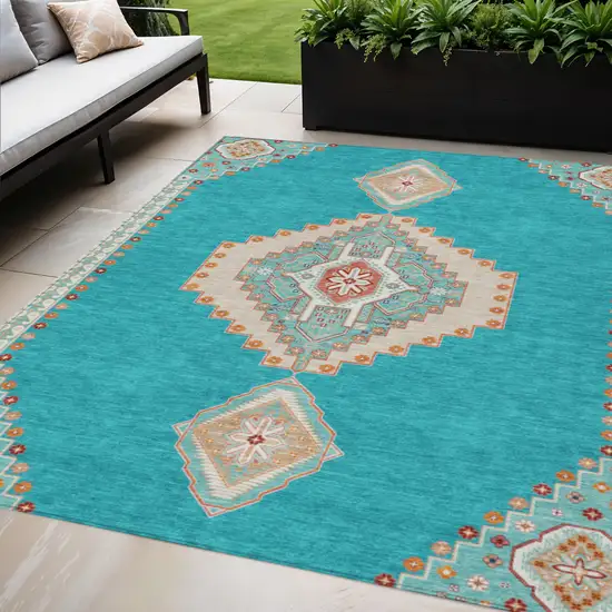 Teal Blue Brown And Ivory Oriental Washable Indoor Outdoor Area Rug Photo 1