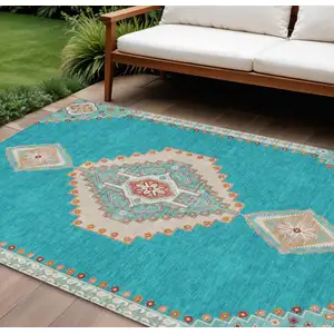 Photo of Teal Blue Brown And Ivory Oriental Washable Indoor Outdoor Area Rug